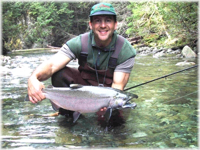 Scott showing a beautiful river Coho!